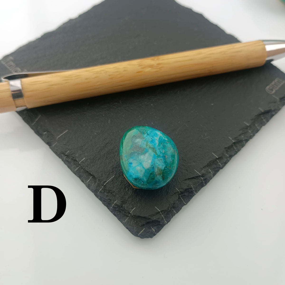 Chrysocolla with Malachite Tumble Stone on a dark slate coaster