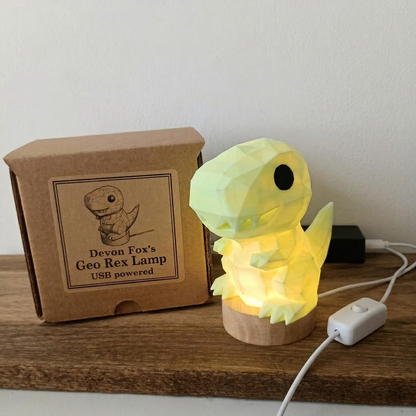 USB-powered Geo Rex lamp with packaging on a wooden surface